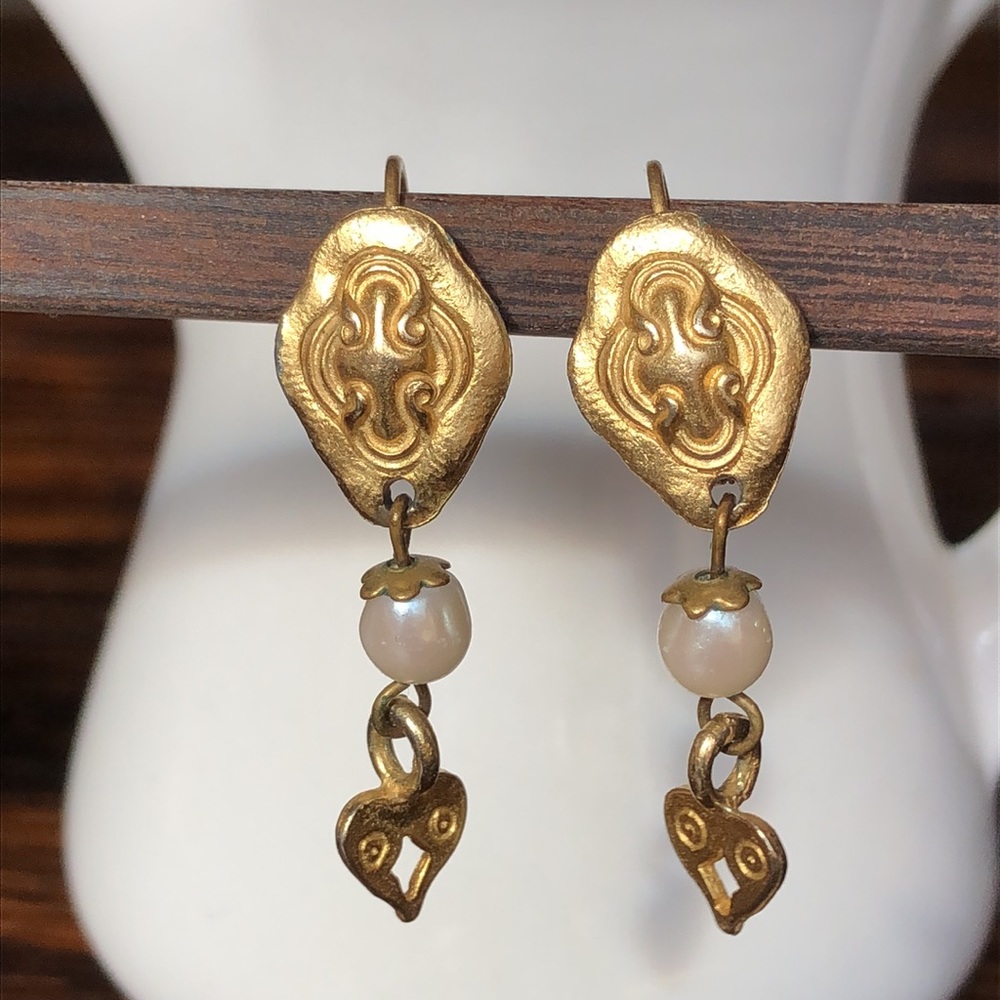 Gold tone embossed earrings with a pearl & heart drop - lever back closure